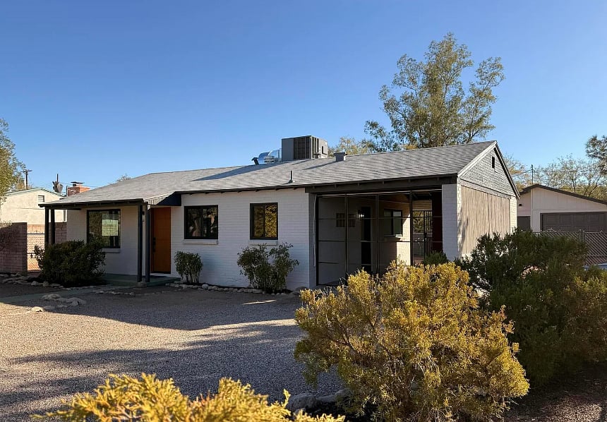 Outdoor with driveway parking for second vehicle.