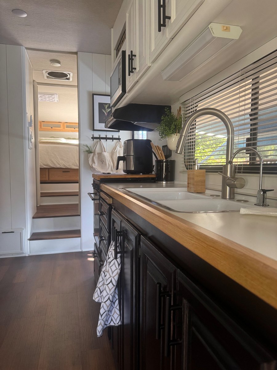 Step up into bedroom & bathroom area