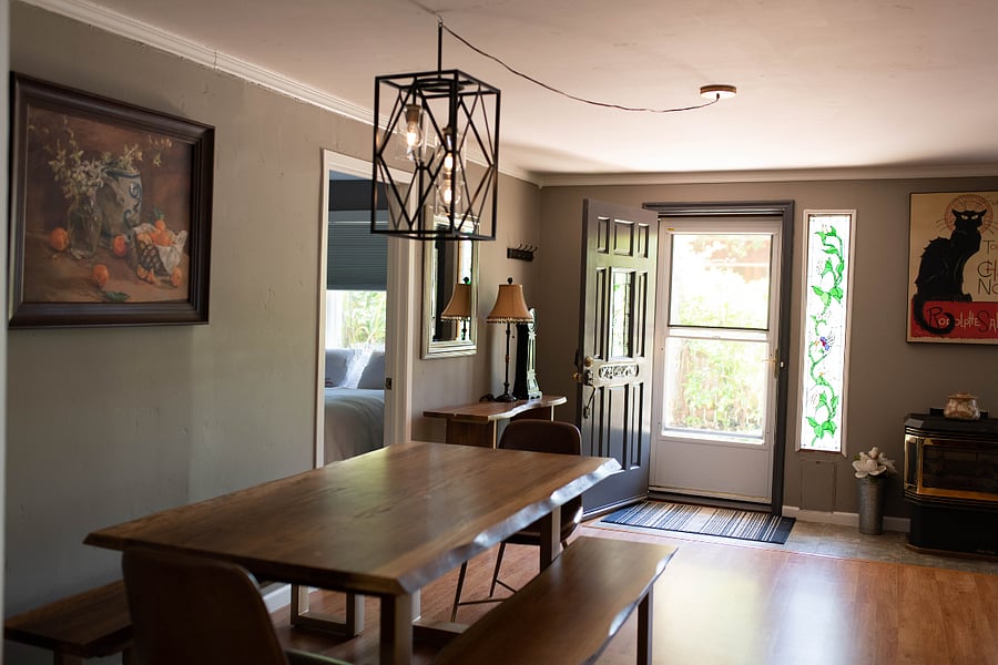 Dining table in the front room by the fireplace.