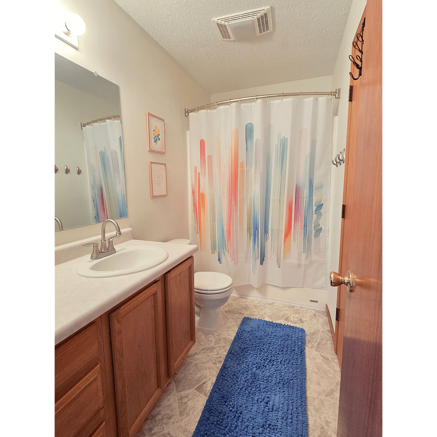All upstairs rooms, including images 11 and 13 share this bathroom.