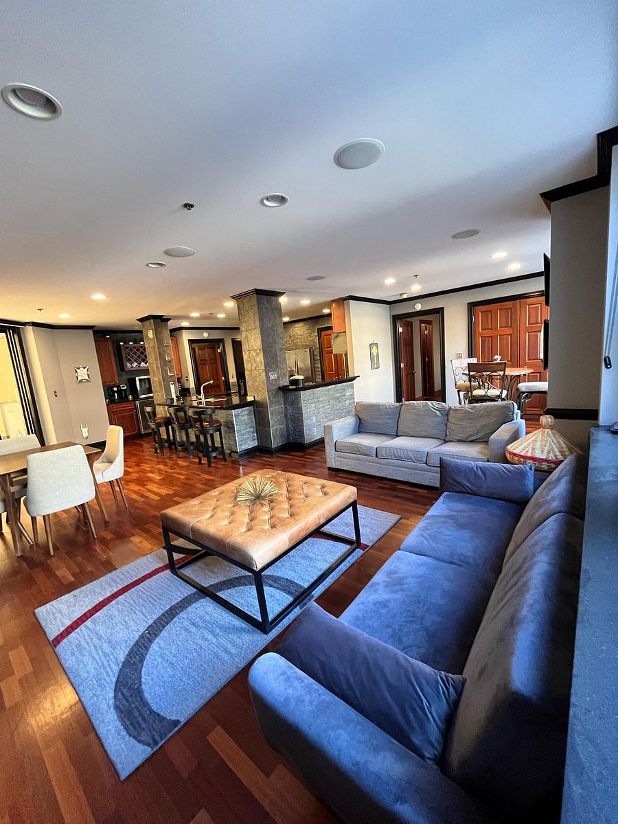 The main living room is equipped with a 32" Roku Smart TV and a cozy fireplace, perfect for relaxing and streaming your favorite shows.