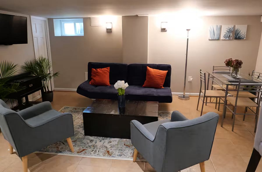The futon photographed here is now replaced with a new sleeper sofa - but this gives the best visual of the living area.