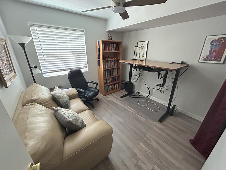 Office with loveseat couch