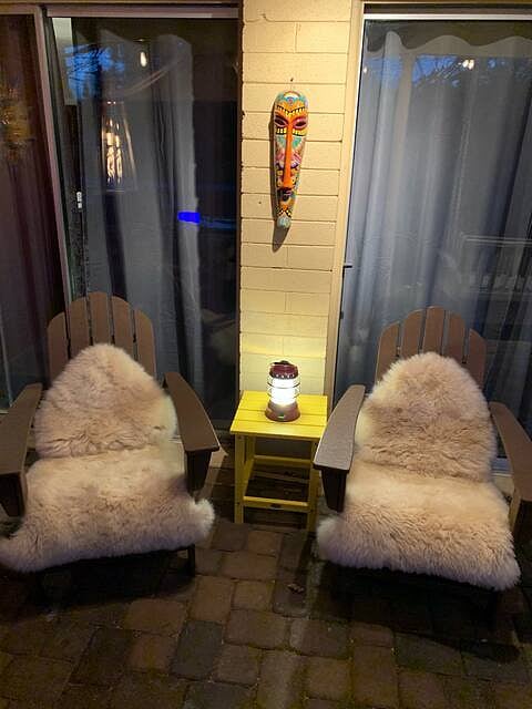 Adirondack chairs with custom sheep skins