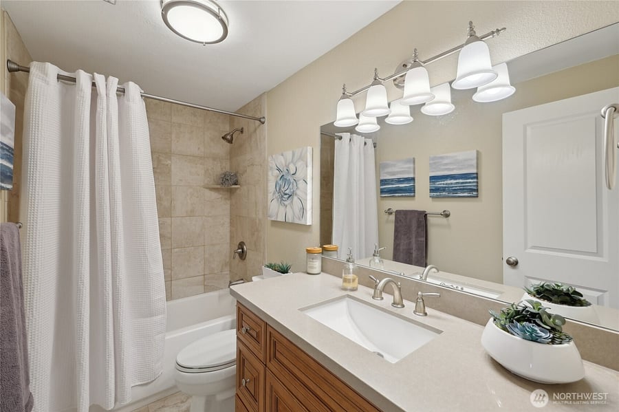 Second bathroom with full bath & shower