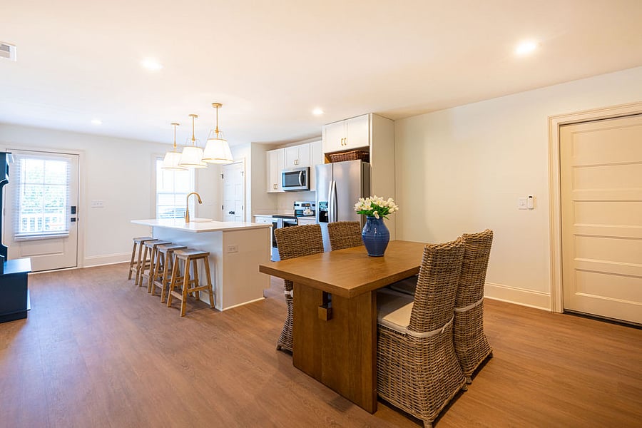The dining area right off the kitchen can seat 4 in addition to the 4 barstools at the island.