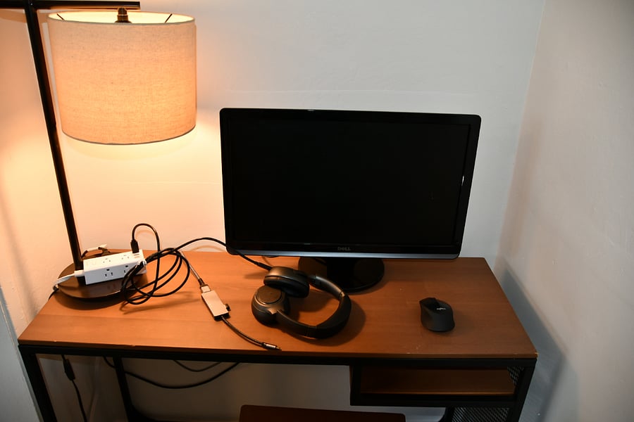 Working console in the closet with full display monitor, extension with wireless head set and wireless mouse. Simply connect Laptop USB-C connector. Power surge extension cord to connect additional accessories. 