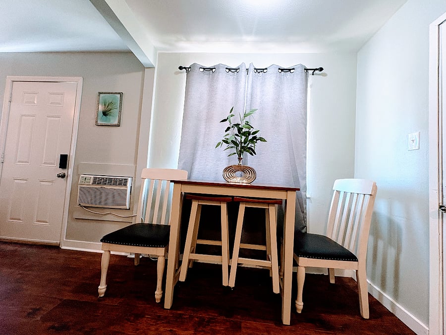 Dining table with side chairs and pull out stools