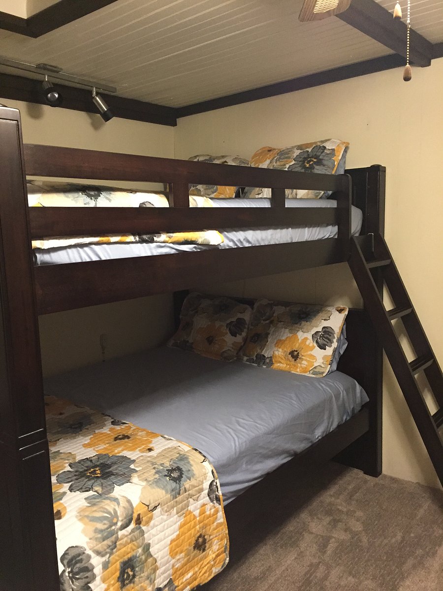 Bedroom with queen size bunk beds. Both bunks are queen size.