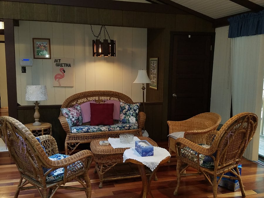 Additional seating area adjacent to living and dining room.