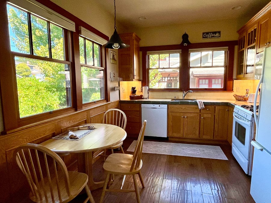 Full kitchen includes dishwasher, stove & oven, full-sized fridge and microwave, plus many small appliances.