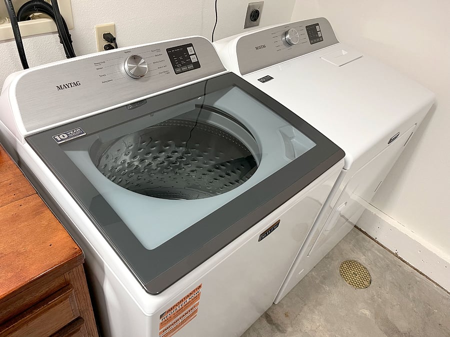 Brand new Maytag large capacity washer/dryer on premises downstairs.