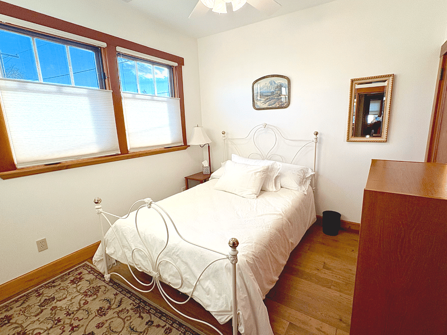 Second bedroom features a full-sized bed, 100% cotton linens and luxury duvet.
