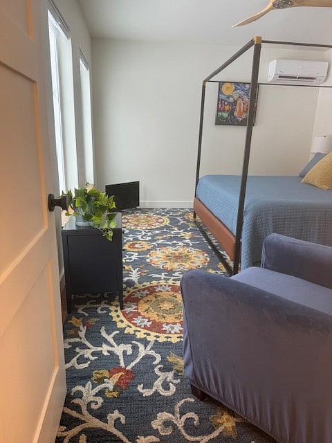 Looking into Primary King Bedroom from Half Bath