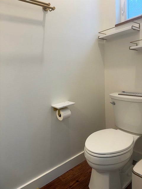 Primary King Bedroom Half Bath Toilet with small Window overl