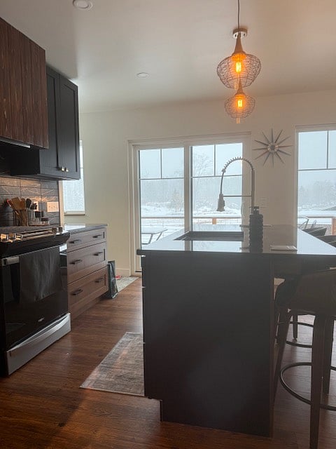 Looking from Kitchen out toward 6 foot Slider and Deck