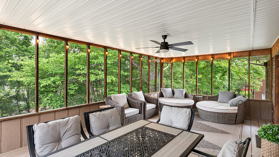 Outdoor screened deck with dining area