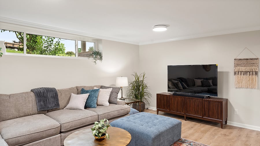 Downstairs living room with 60" smart TV