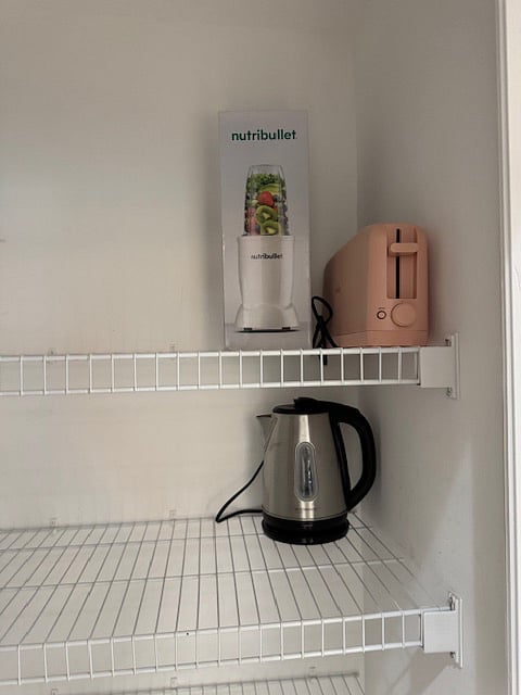 Nutri-Bullet, toaster, electric hot water kettle.
