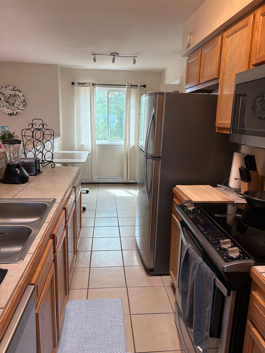 Full Kitchen, pots & pans, utensils, knives, cups, plates, bowls and appliances.