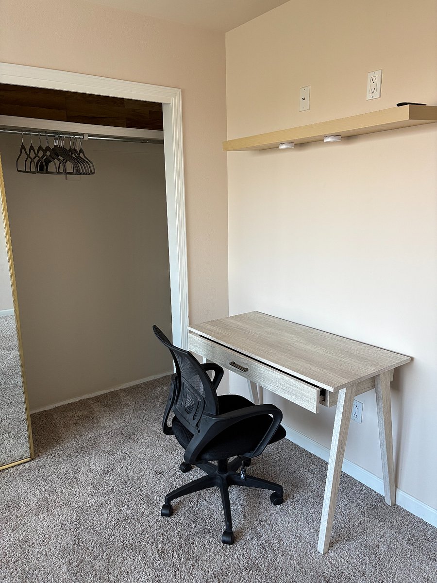 Bedroom #2, includes 2 twin stackable bed frames and mattresses that convert into a king size bed if needed, sleeps up to 2 people. Desk for study or work.