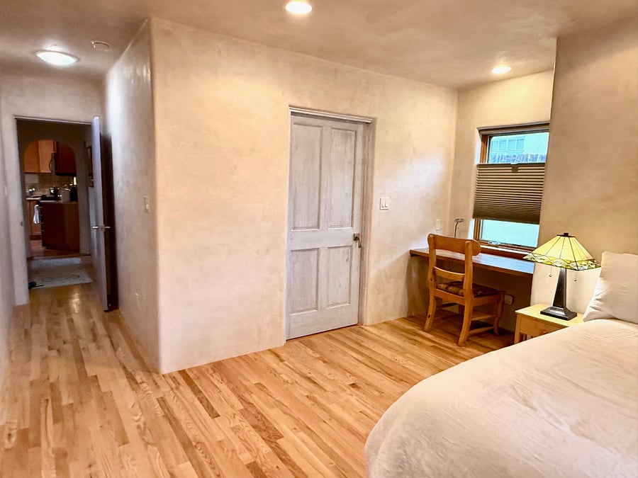 ensuite bath and built in workspace in the primary bedroom.