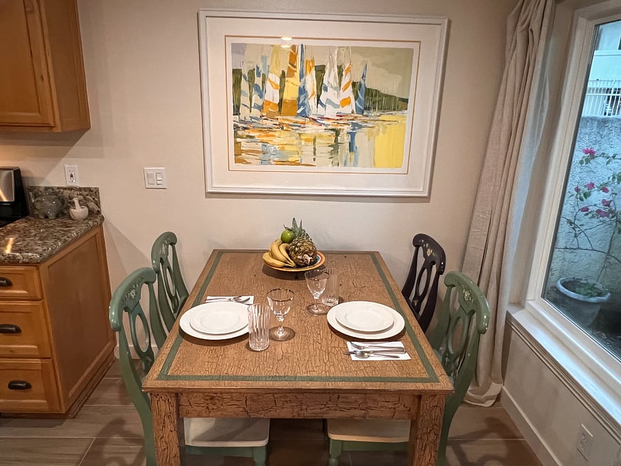 Dining area with Makasa dishes and sliver set. 