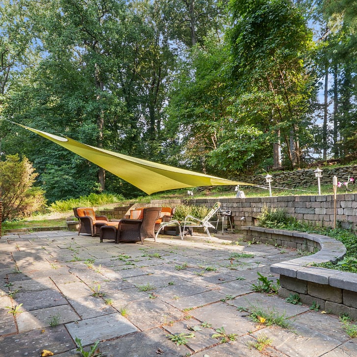Outdoor living room with fireplace.