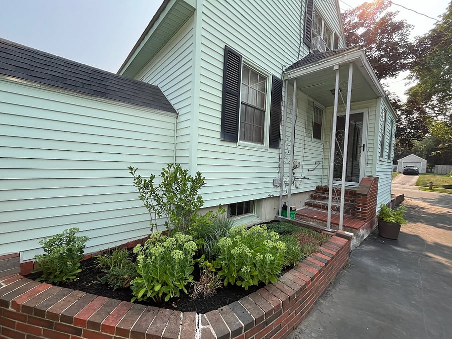 Side yard with mudroom entrance