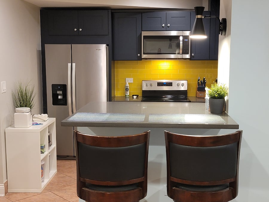 Kitchen bar is perfect for breakfast. Stream the news by linking your account to the provided Alexa device.