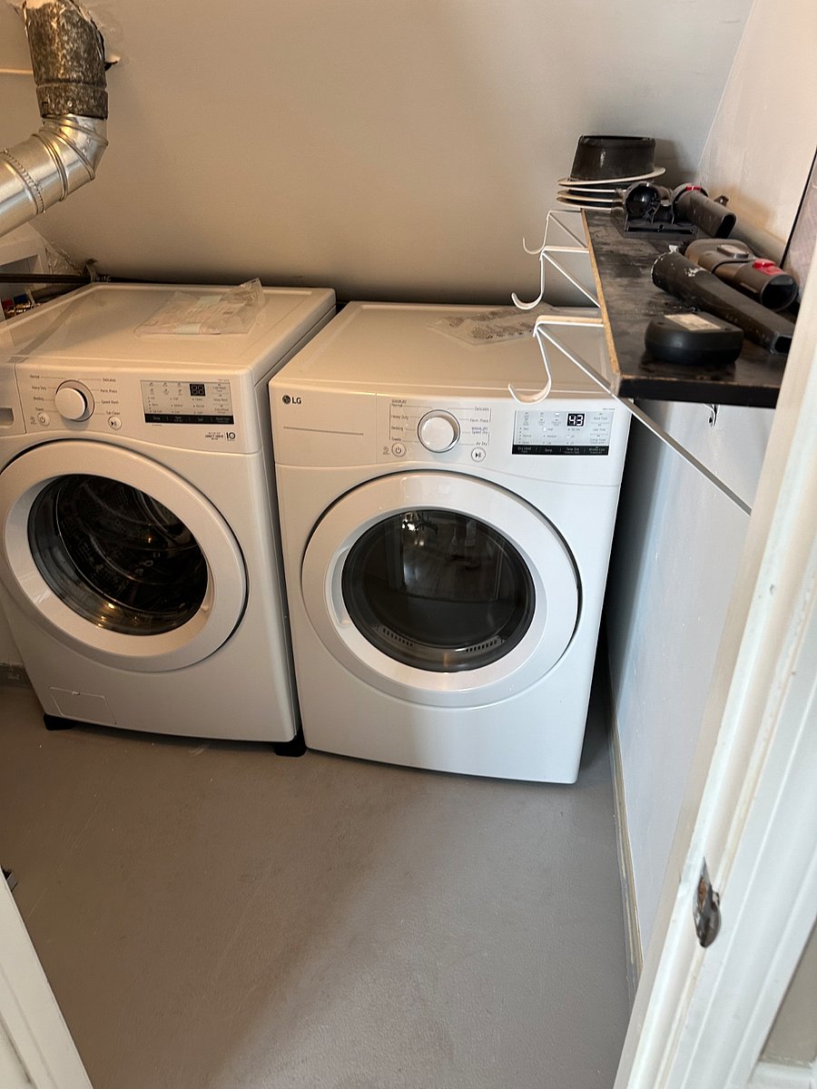 Full-sized private in-unit washer and dryer