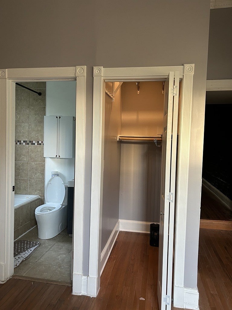 En-suite bathroom and walk-in closet in master.