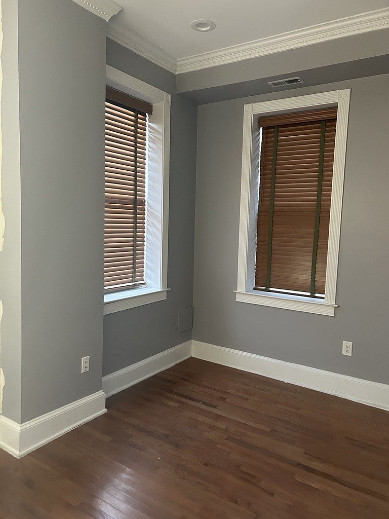 This bedroom (master) has since been furnished with a queen bed, dresser, and nightstand.