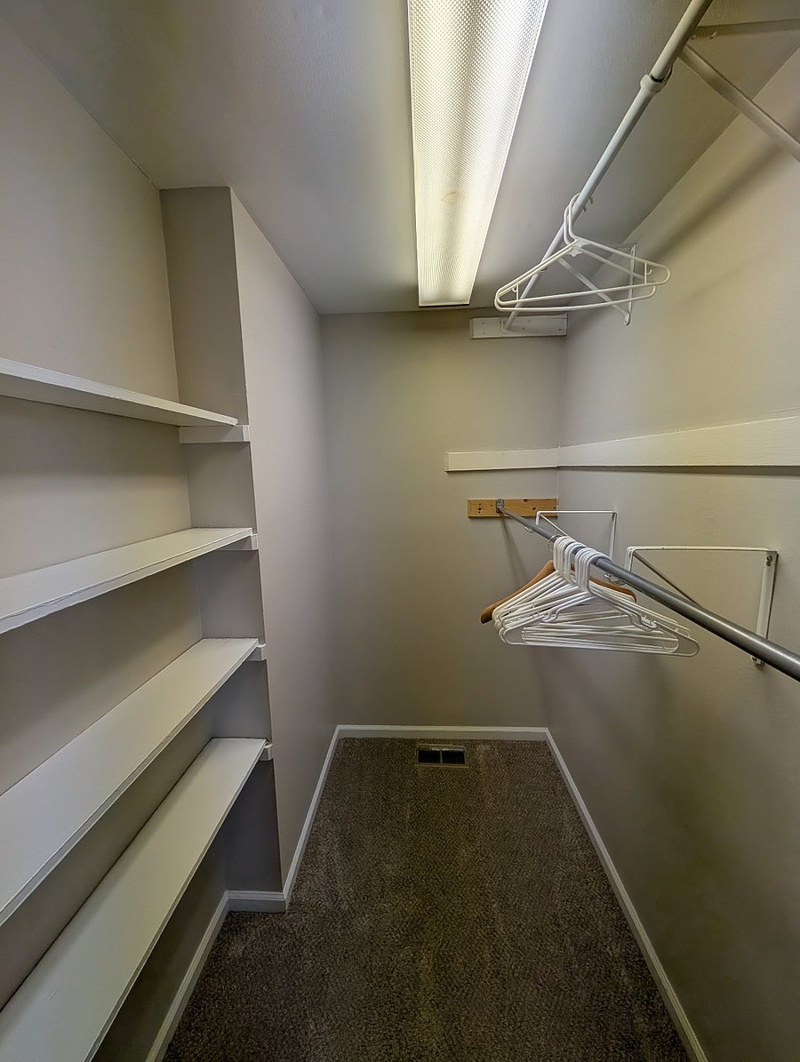 Walk-in closet for primary bedroom
