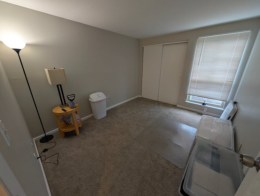 Spare bedroom with extra supplies and storage space.