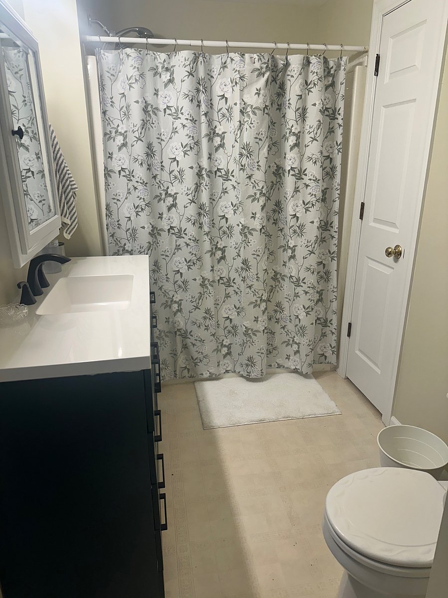 Full Bathroom with Vanity and Shower