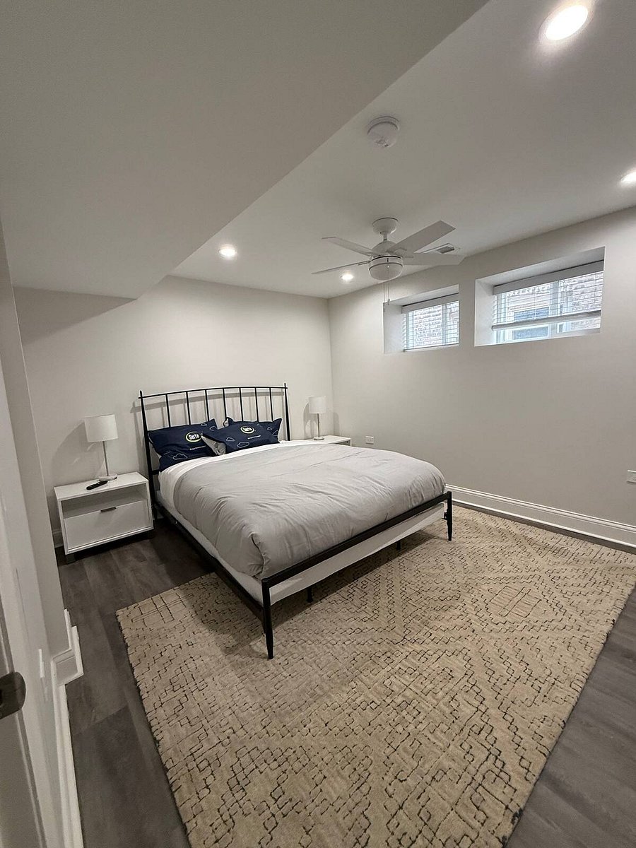 Contemporary queen bedroom with CB2 furniture. Each bedroom has its own private walk in closet, dresser and 43 Samsung Smart TV. Whisper quiet Hunter Ceiling Fan. Mattresses and pillows are fully encased in protective covers for your convenience.