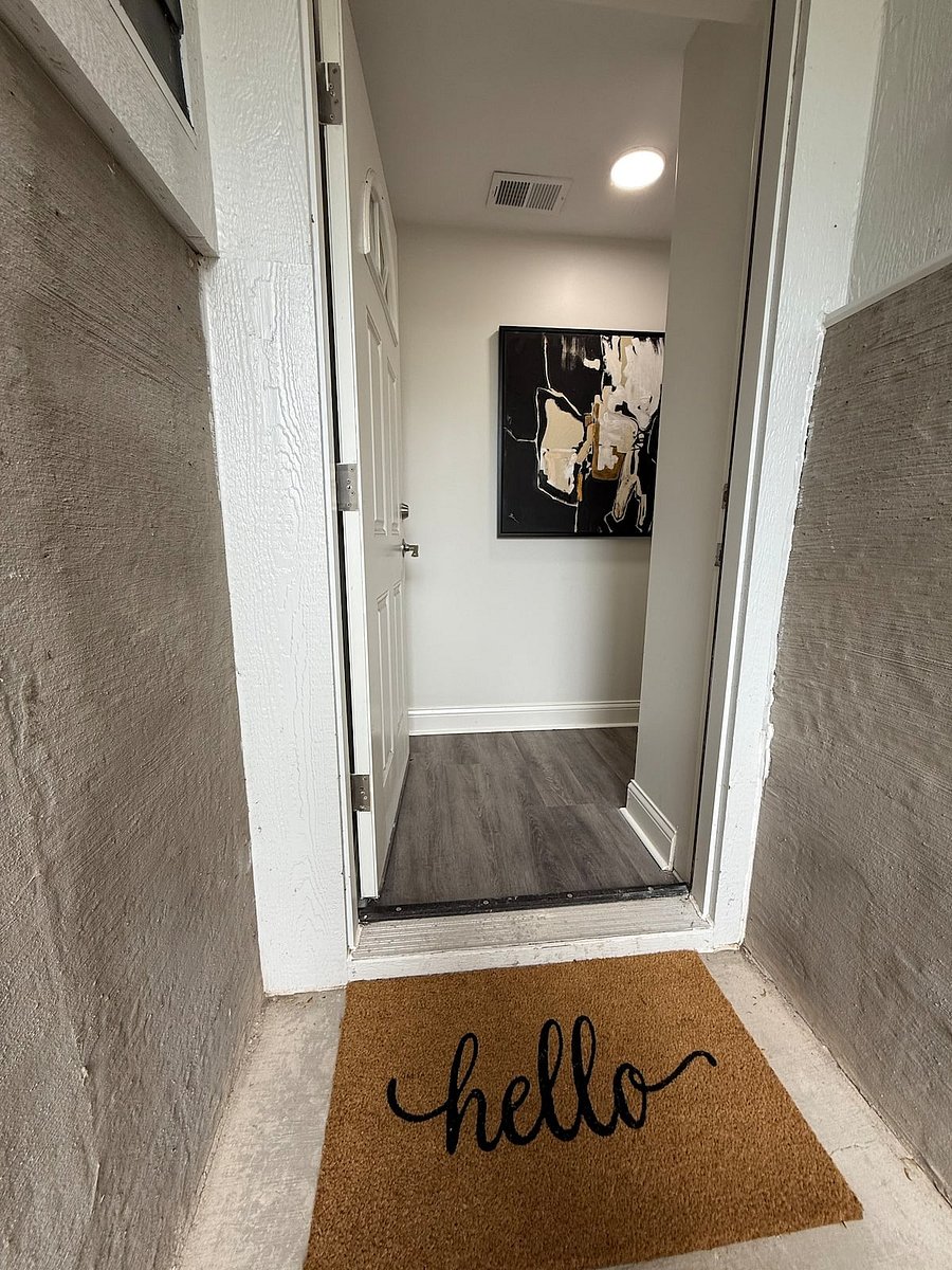 Private covered entrance to the garden apartment space. Walk in entry hall closet for additional storage.
