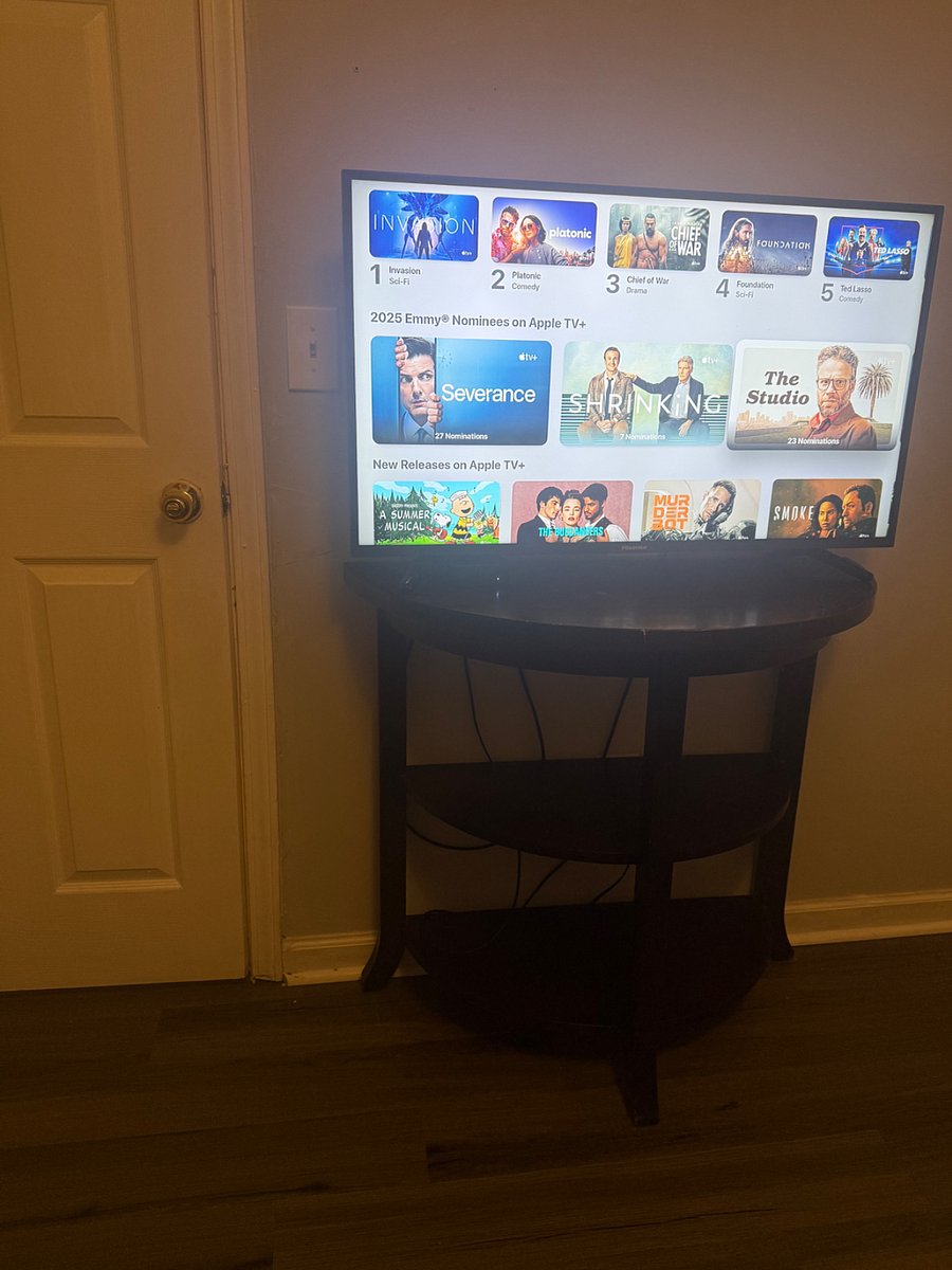 The bedroom includes a flat-screen smart TV with an Apple TV box, giving you access to all your favorite streaming apps such as Netflix, Hulu, Disney+, Prime Video, and Apple TV+.