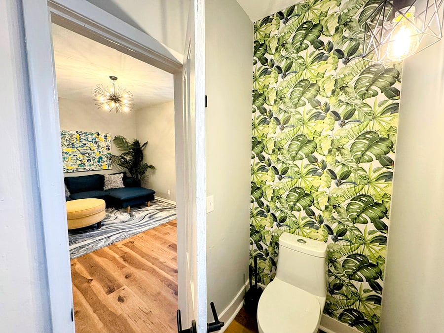 The upper bathroom is stylish and spotless