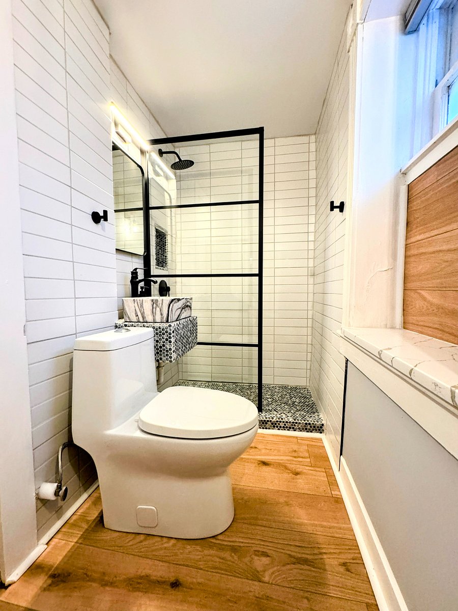 The lower unit bathroom is stylish and spotless