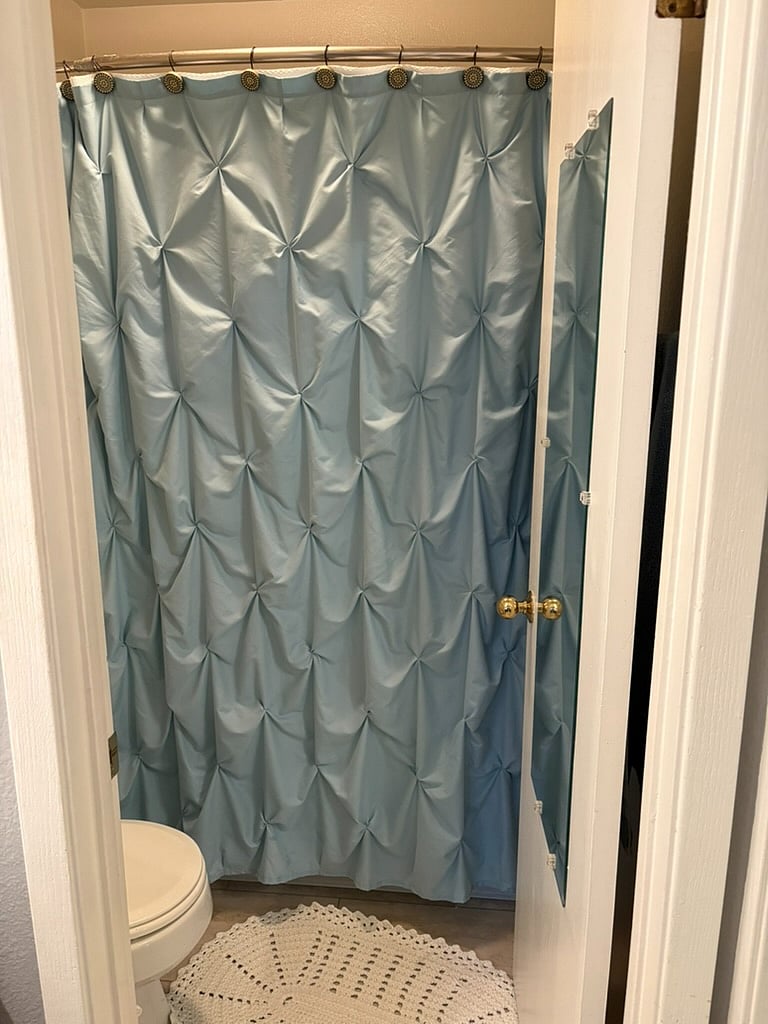 Shower/bath in master bathroom.