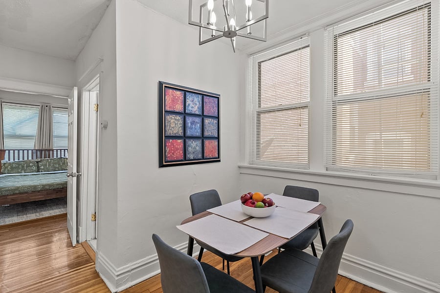 Dining nook with painting.