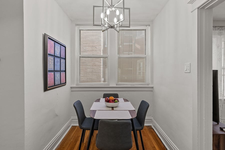 Dining nook with painting.
