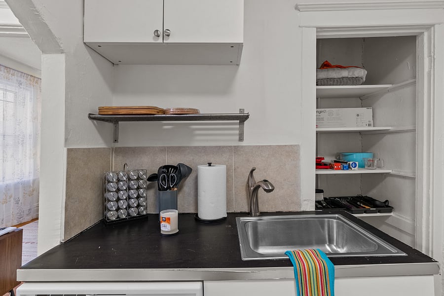 Spice rack, silverware, and all