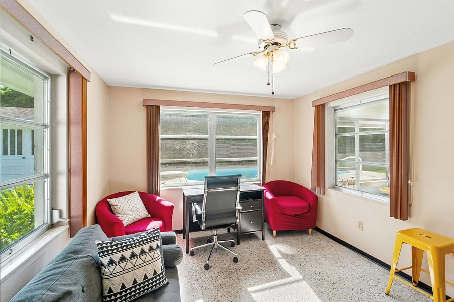 Work in this bright office overlooking the pool!