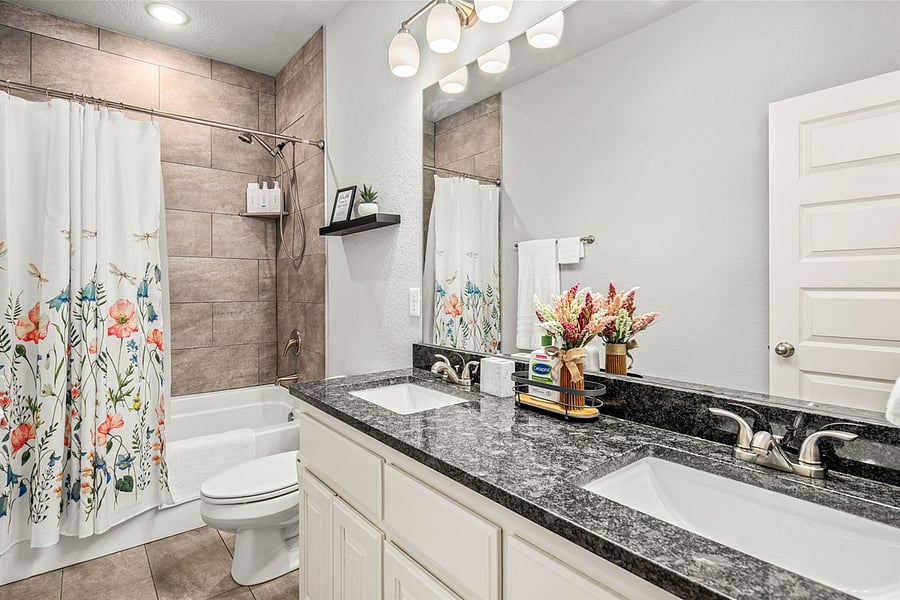 First Floor Guest Bathroom with Shower/Tub Combo.