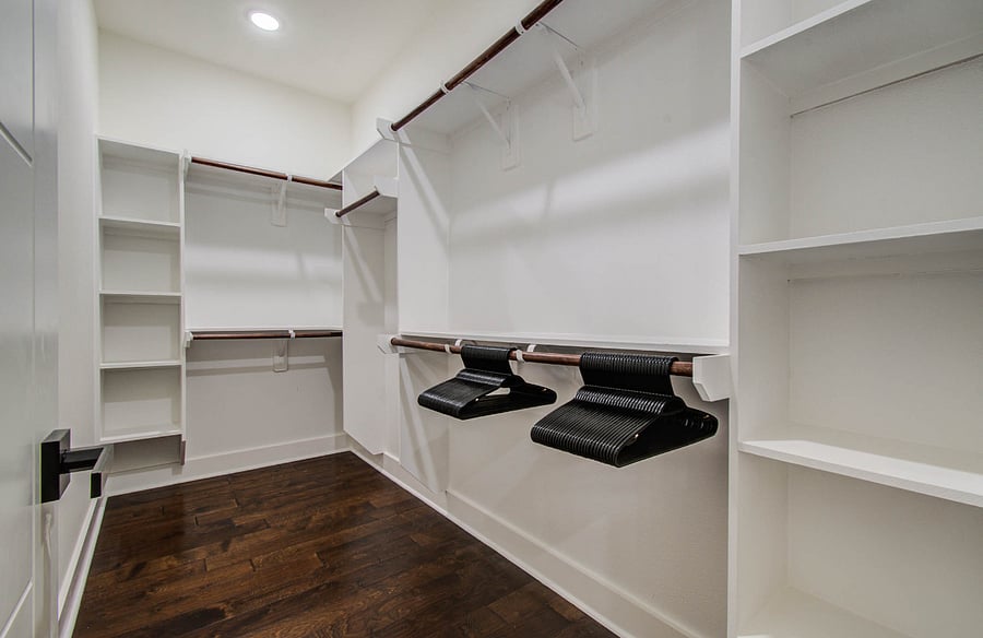 Spacious walk-in closet with plenty of storage