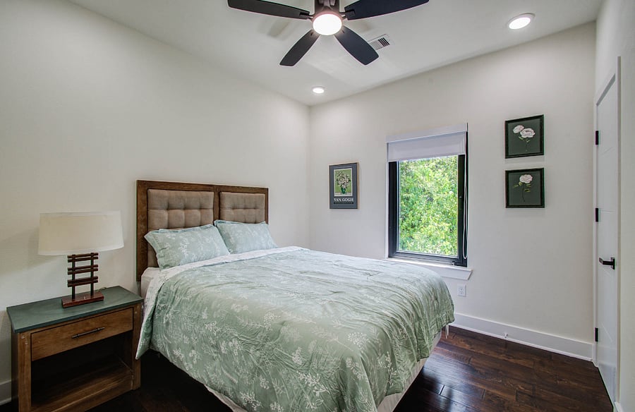 Guest bedroom-plush mattress and a walk-in closet