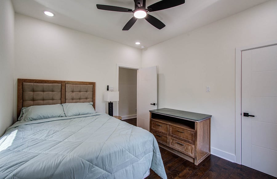 Guest bedroom with a walk-in closet